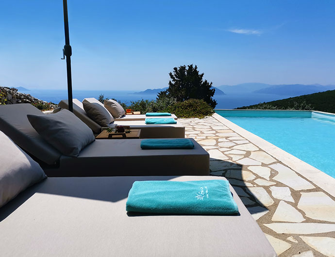 Modern exterior furniture in Private pool of Lefkada villa Geofos