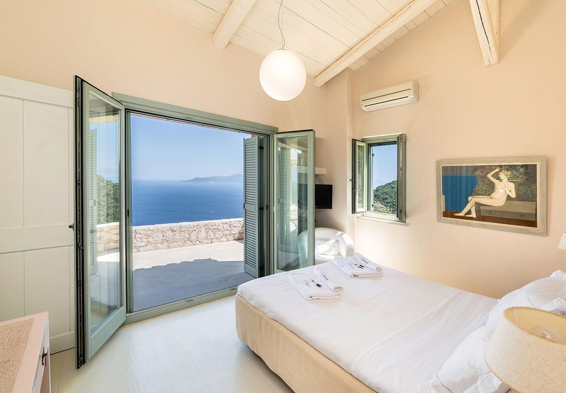 Urania Villas Lefkada Greece - Villa Helios Lefkada bedroom facing the vibrant blue colors of the Ionian sea