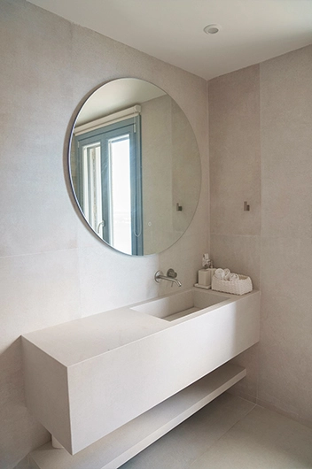 Hamam bathroom of villa Rhea, the mirror and the handmade sink.